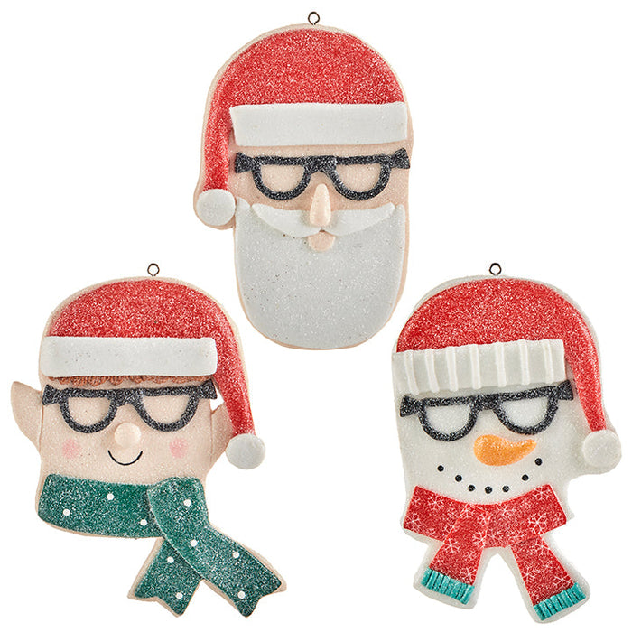 The RAZ Santa Elf Snowman Christmas Ornament Set of 3 includes cheerful glittery ornaments, each with black glasses, a red hat or scarf, and festive expressions. Part of the Eat Drink Be Merry Collection.