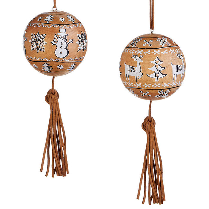 The 7" RAZ Wood with Tassel Christmas Ornament Set of 2 features round brown wood ornaments with white winter designs—one with a snowman and trees, the other with a reindeer and trees—plus brown tassels and hanging loops.