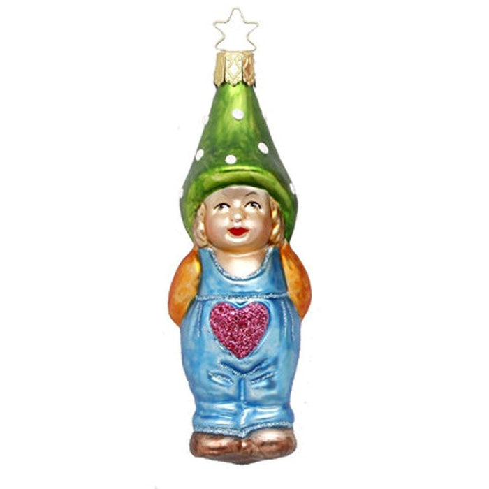 The Willi Gnome Christmas Ornament by Inge-Glas (68572) is a European glass ornament featuring a gnome in blue overalls with a pink glittery heart, green polka-dot hat, and gold star topper for hanging.