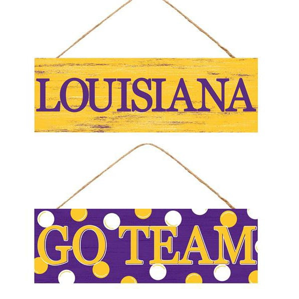 The Purple Yellow Louisiana or Go Team Assorted Wall Hanging (AP807899) features two MDF signs. The top sign says LOUISIANA in purple on yellow, and the bottom reads GO TEAM in yellow with a purple/yellow polka dot backdrop—ideal for any spirited wall display.