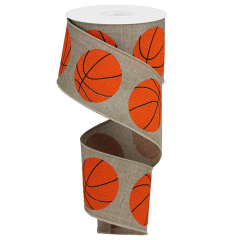 The 2.5 Light Beige Basketball Print Ribbon (RGA151601) features a repeating pattern of large orange basketballs on durable polyester, perfect for sports-themed crafts and decorations.