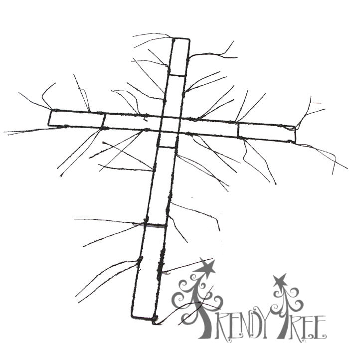 A simple black and white sketch of the 27" Twig Work Cross Frame XX764535 shows its wire frame with multiple attachment points and twig-like lines extending outward. The “Trendy Tree” logo appears in the bottom right corner.
