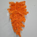 The 24 Halloween Teardrop Orange 82298-OR hangs upside down on a gray wall, featuring bright orange artificial pine branches and a small white tag, creating a striking Halloween decoration.