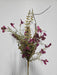 The 24 Purple Lavender Berry Spray (63048-PU) features a decorative bouquet of lavender flowers and berries with green leaves and twigs, set against a plain white background.