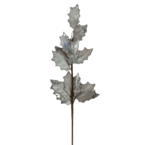 The 27 Silver Metallic and Sugared Holly Leaves and Berries Spray 32232 features textured, jagged holly leaves that capture light for a shiny look. The berries enhance its appearance, making it stand out against a plain white background.