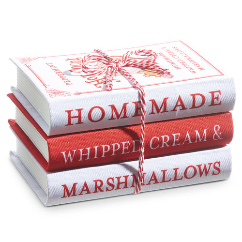 The 8 Hot Cocoa Faux Book Stack (4316112) features three red and white books tied with string, with spines reading HOMEMADE, WHIPPED CREAM &, and MARSHMALLOWS—ideal for cozy hot cocoa decor.