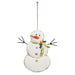 A 6 Snowman Ornament (4316228) featuring a green scarf, carrot nose, and twig arms hangs by a red and white string.