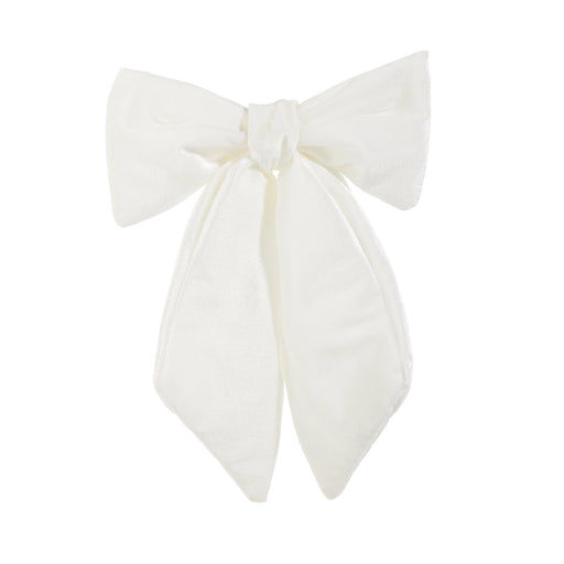 The 11" Ivory Velvet Bow Clip-on Ornament 4550510 features wide loops and long tails, perfect for festive décor or as a Christmas Shoppe accent, shown on a plain white background.