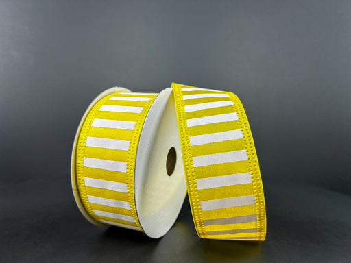 A pair of spools are elegantly wrapped with the 1.5X10Y Yellow White Satin Stripes Yellow Edge Ribbon 46425-09-22, set against a plain gray background.