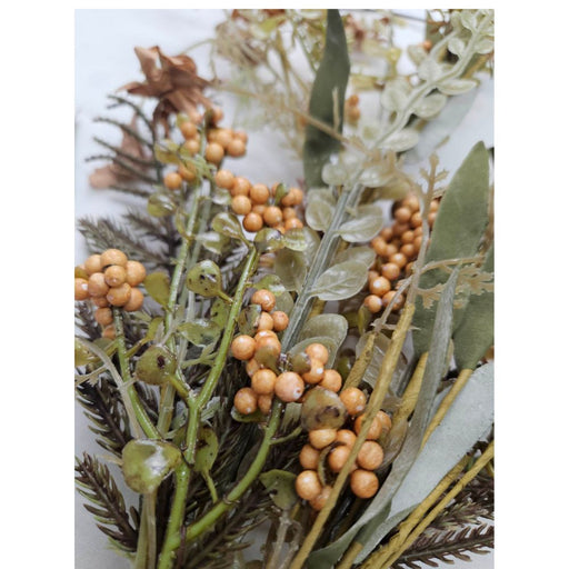 A close-up of the 24 Beige Lavender Berry Spray 63048-BE, showcasing clusters of small yellow berries, green leaves, and fern-like foliage arranged on a light background.