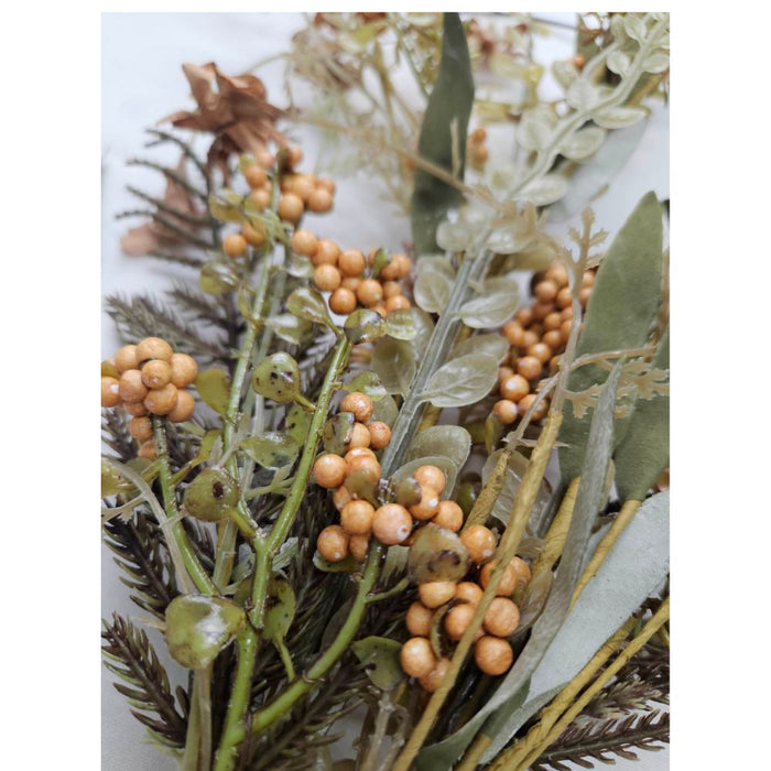 A close-up of the 24 Beige Lavender Berry Spray 63048-BE, showcasing clusters of small yellow berries, green leaves, and fern-like foliage arranged on a light background.