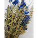 A bouquet with dried plants and vibrant royal blue flowers features a 24 Royal Blue Lavender Berry Spray (63048-RO BL), accented with yellowish-green leaves and twigs, set against a plain, light background.