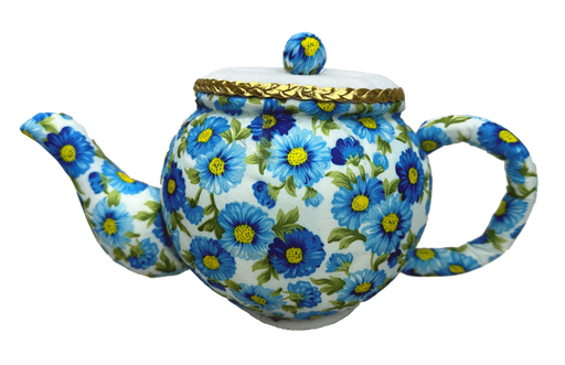 Meet the 6H x 10W Blue Tea Pot Ornament 63202BL, showcasing a vivid blue and yellow floral pattern on a white background. It boasts a gold-trimmed lid with matching floral designs on the spout and handle, ideal for adding charm to any space.