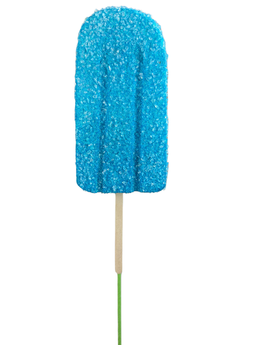 A popsicle embellished with sugar crystals, featuring a vibrant blue hue, is perched on a 20" by 4" Blue Popsicle Pick 63396BL against a simple backdrop.