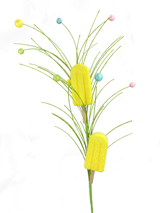 The 30\ Yellow Popsicle Spray 2 Stems 63397YW features two yellow popsicles as flowers with round candies on green stems, set against an abstract multicolored background, creating a vibrant and whimsical scene.