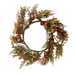 The 20 Mixed Mini Pumpkin Wreath 64583 features green and brown leaves, twigs, and small orange pumpkins, beautifully arranged in a round design on a white background.