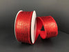 Two spools of 1.5X10Y Red Crackle Lame Ribbon 75206-09-12 are set on a plain black background—one upright, the other leaning forward with shiny red ribbon partially unspooled and curved, showing the textured pattern.