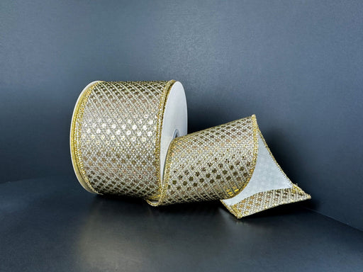 The 2.5X10Y Taupe Gold Metallic Dragonscale Dots Ribbon (78521-40-35) is shown partially unrolled against a dark background, highlighting its luxurious gold mesh and glittery, dragonscale-inspired diamond pattern.
