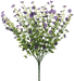 The 17.5 Mixed Forget Me Not Purple (Model 83416-PU) features delicate blooms with lush green stems and leaves, creating a full appearance that highlights the arrangements intricate structure.