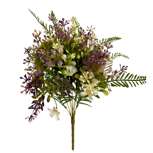 The 16 In Plastic Leaves Bush X 9 84694-Lv features small purple, green, and white artificial blossoms with fern-like plastic leaves on a single brown stem, arranged against a white background.