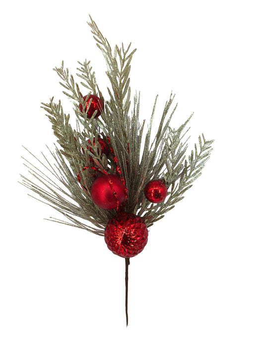 The 24" Red Needle Pine Plastic Leaf Spray 85154-RD features glittery silver pine branches, shiny red ornaments, and textured baubles—all arranged on a plain white background for a festive Christmas display.