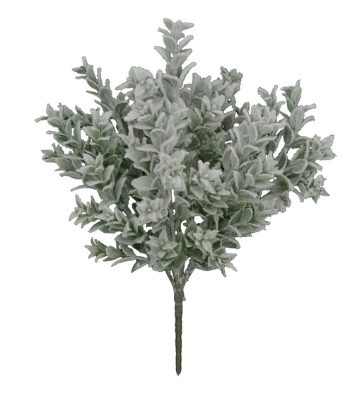 The 18" Snowed Tea Leaf Bush with 7 Stems (85286) features elegant white foliage that stands out beautifully against dark surfaces, creating a striking display of delicate charm.