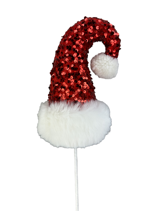 The 20" by 5" Red and White Sequin Santa Hat Spray, model number 86033RDWT, boasts a glittery design adorned with sparkling red and white sequins, edged with fluffy white trim and finished with a pom-pom. It is elegantly mounted on a thin stick.
