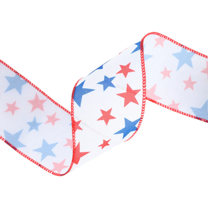 The 2.5 White with Red and Blue Stars Wired Ribbon (9500W-029-63E) features red and blue stars on a white backdrop, accented with a red-edged wave pattern for an elegant decorative touch.