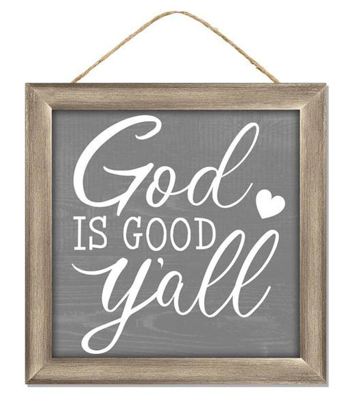 The 10 Sq Grey/White God Is Good YAll Sign (AP7218) is an MDF/Paper sign with a wooden frame, white script, heart accent, and rope hanger on a gray background.