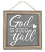 The 10 Sq Grey/White God Is Good YAll Sign (AP7218) is an MDF/Paper sign with a wooden frame, white script, heart accent, and rope hanger on a gray background.