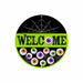The 8Dia Metal Welcome W/Eyeballs Sign (Black/White/Orange, MD1369) features a round metal design with bold WELCOME letters and colorful cartoon eyeballs for a fun touch.