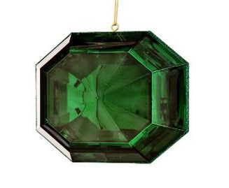 The 6" Acrylic Square Precious Gem Ornament Emerald MTX67415 features a faceted, emerald-green, octagonal design hanging from a thin gold string against a white background.