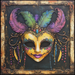 The 10 x 10 Mardi Gras Mask Sign TTE-149 features a vibrant mask adorned with feathers and jewels in purple, green, and gold hues, set against a textured dark background. It is elegantly framed by an aged, decorative border reminiscent of a vintage metal sign.