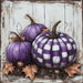 The 10 x 10 Purple & White Check Pumpkins Sign (TTE-042) features three purple and white check pumpkins with autumn leaves and twigs on a rustic white wood background—ideal for fall decor.