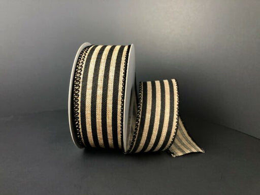 The 1.5X10Y Natural Linen/Black Cabana Stripes Ribbon Q817009-21 features black and beige stripes with a black edge, displayed against a dark background. A section is unrolled and upright, highlighting its pattern and texture.