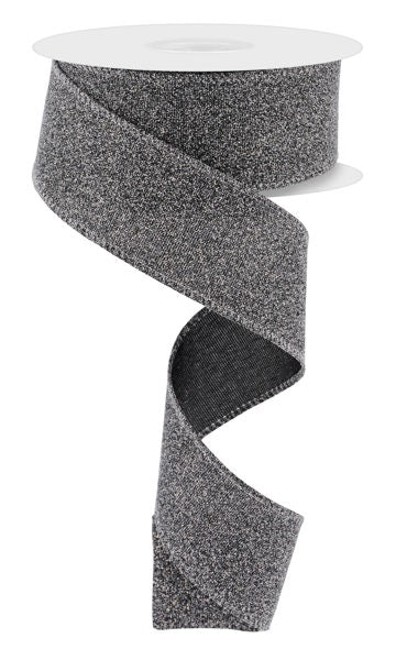 A spool of 1.5 X 10Yd Black Crystal Shine Ribbon (RGE199402) is partially unrolled, forming a spiral shape against a plain white background.