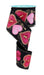 The 2.5 x 10 yd Black/Multi Heart Locks Ribbon (RGF152202) features pink, red, and gold heart lock and keyhole designs, artistically curled to display its decorative accents on a partially unrolled spool.