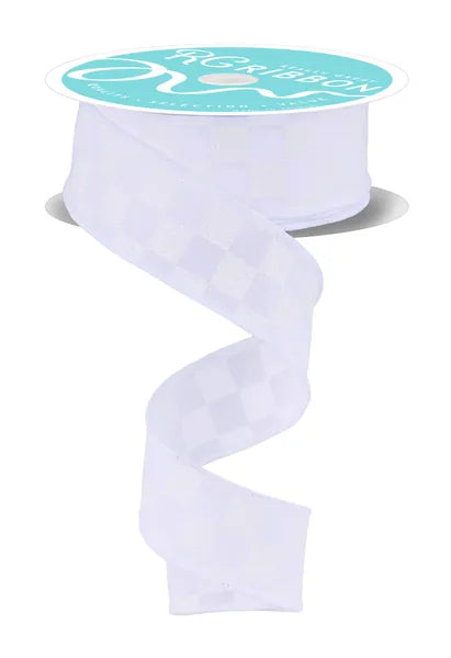 A spool of 1.5X10YD White Print Glitter Check Ribbon (RGH103627) with a teal top label is shown unspooled in a loose spiral, displaying its subtle checkered glitter pattern.