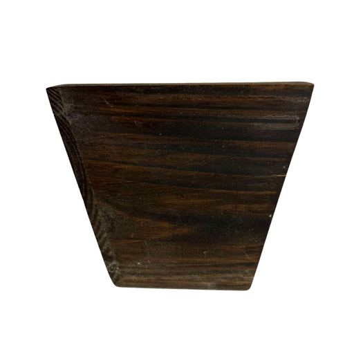 The 6 Natural Wood Square Pot WD384N is a wooden block with a dark brown, textured surface showcasing natural wood grain patterns. Its trapezoidal form stands elegantly against a plain white background.