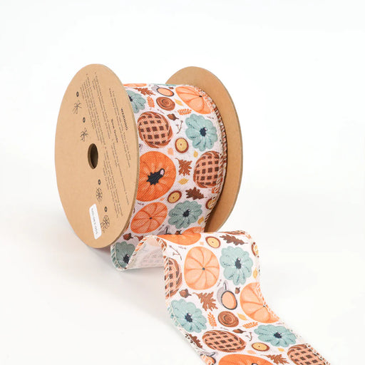 The 2.5 Natural and Multi Pumpkin Frenzy Wired Ribbon (WR-10367-063-10) features pumpkins, pies, and gourds on a white background—ideal for bringing festive autumn charm to your seasonal decor.