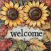 The 10 x 10 Welcome Fall Sunflowers Sign (2) TTE-297 showcases two sunflowers and autumn leaves around a bold “welcome” on a charming metal sign.