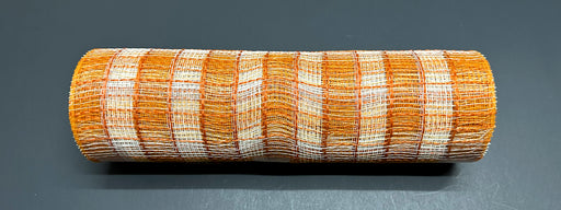 A roll of 10X10Y Rust-Cream Small Chex Plaid Mesh XB235510-31, with a subtle orange and white wavy plaid pattern, is displayed on a dark gray surface.