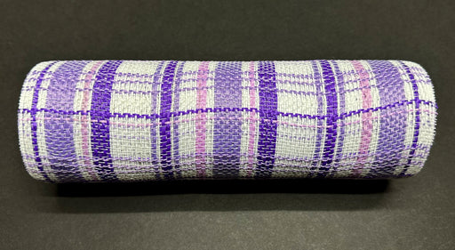 The Purple-Lavender-White Fabric Plaid Mesh, 10X10Y XB240110-11 cylindrical object features a checkered pattern of purple, lavender, and white fabric against a dark background.