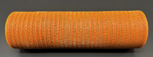 A roll of 10X10Y Rust Breeze Solid Mesh XB240710-31, crafted from durable polypropylene, rests against a dark backdrop. The orange rust fabric features a textured, woven look and is tidily rolled, revealing a uniform pattern throughout.