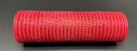 A roll of Red Breeze Metallic Mesh XB240810-12 measuring 10 inches by 10 yards lies horizontally on a smooth, dark surface. The woven texture of the mesh and its vibrant metallic red color create a striking contrast with the background.