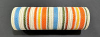 The 10X10Y Blue Orange Moss Yellow Fall Stripe Mesh (XB253210-05) features horizontal stripes in blue, yellow, orange, green, red, and white, displayed on a cylindrical object against a dark gray background.