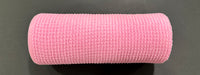 The 10X10Y Pink All Snow Fuzz Mesh XB253610-03, featuring a textured, grid-like surface, is shown lying on a black background.