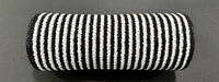 A cylindrical object wrapped in 10X10Y Black-White All Snow Fuzz Stripe Mesh XB253810-20, featuring alternating black and white vertical stripes, is placed on a dark, flat surface.