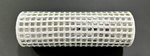 A roll of 10X10Y Silver Metallic Wide Mesh (XB254110-51) with a grid pattern and silver sheen rests on a black surface.