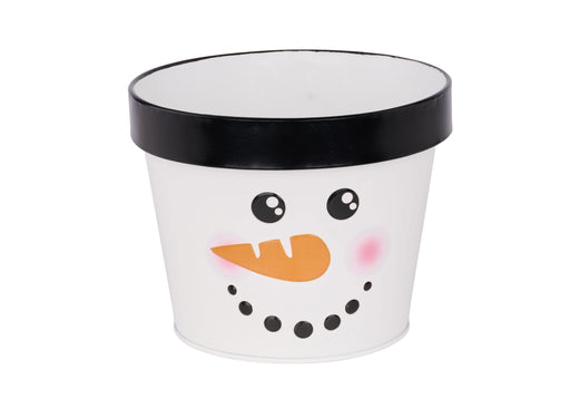 The 7x5.5 Snowman Pot XC0160 features a cute snowman face with a black rim, orange carrot nose, rosy pink cheeks, and black dot details, shown on a white background.